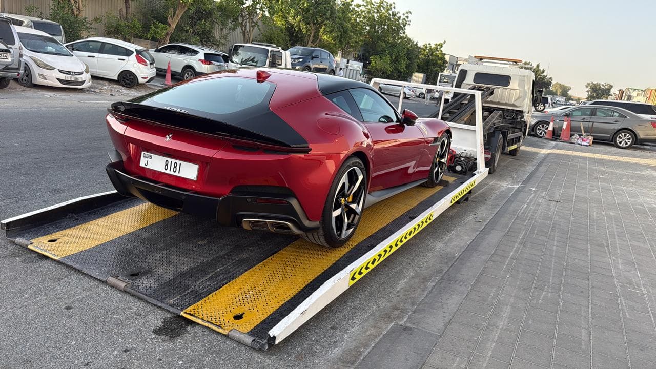 Ferrari 12Cilindri on a full down flatbed recovery in Dubai